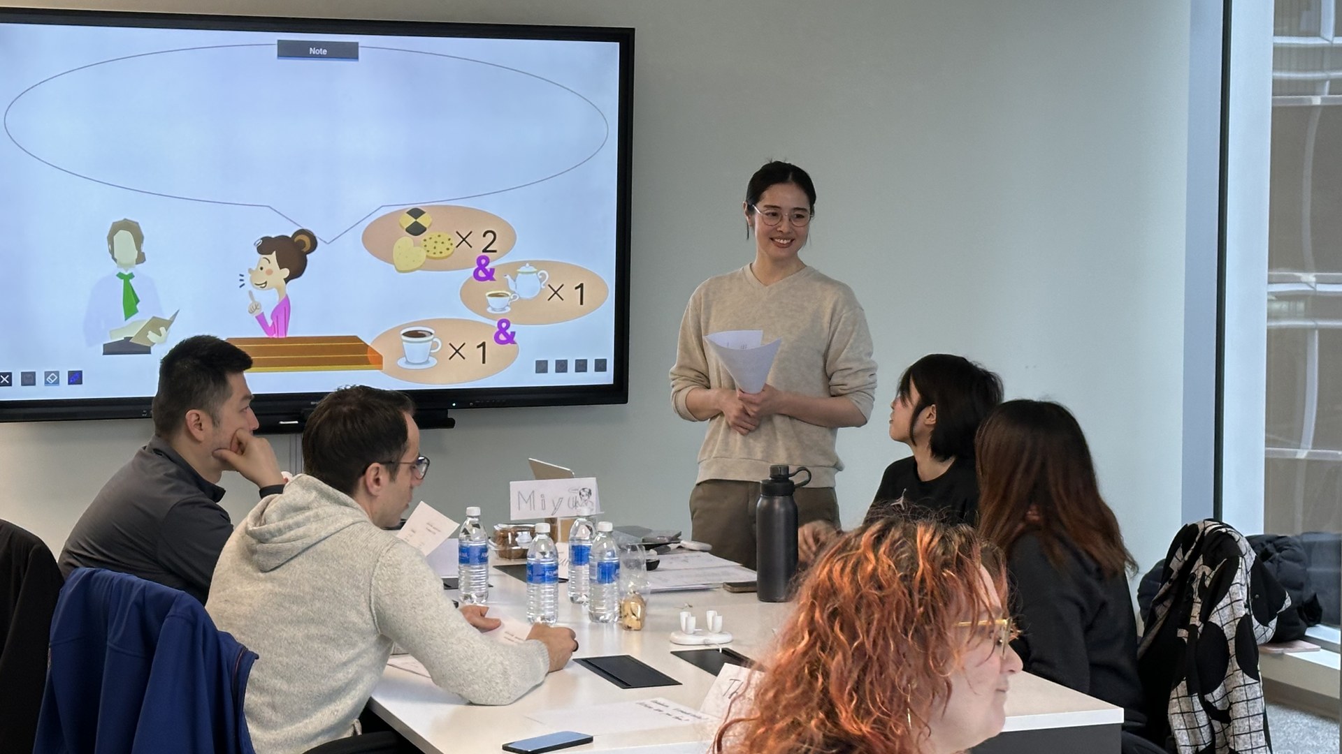 Student raising a hand during class — Why Learn Japanese with NIHOんDIA